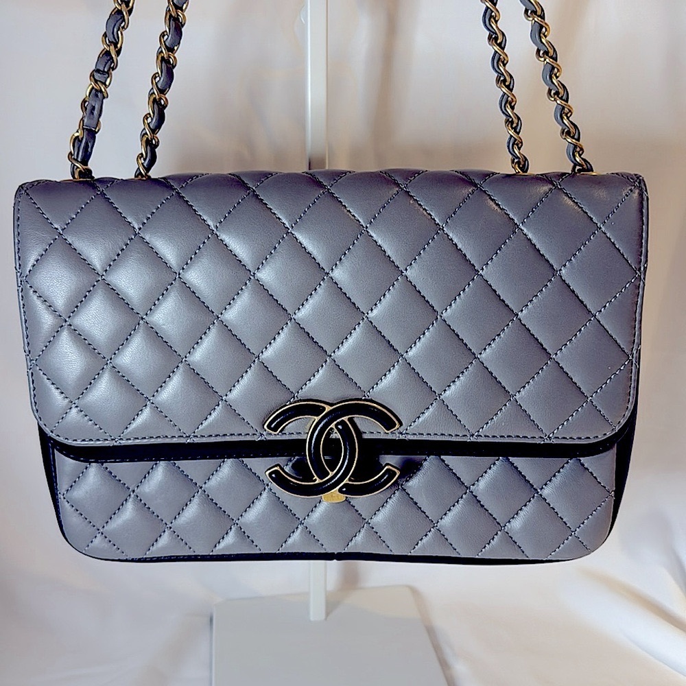 NWOT  CHANEL TWO TONE DOUBLE FLAP BAG
GRAY AND BLACK WITH LEATHER COVERED
CC